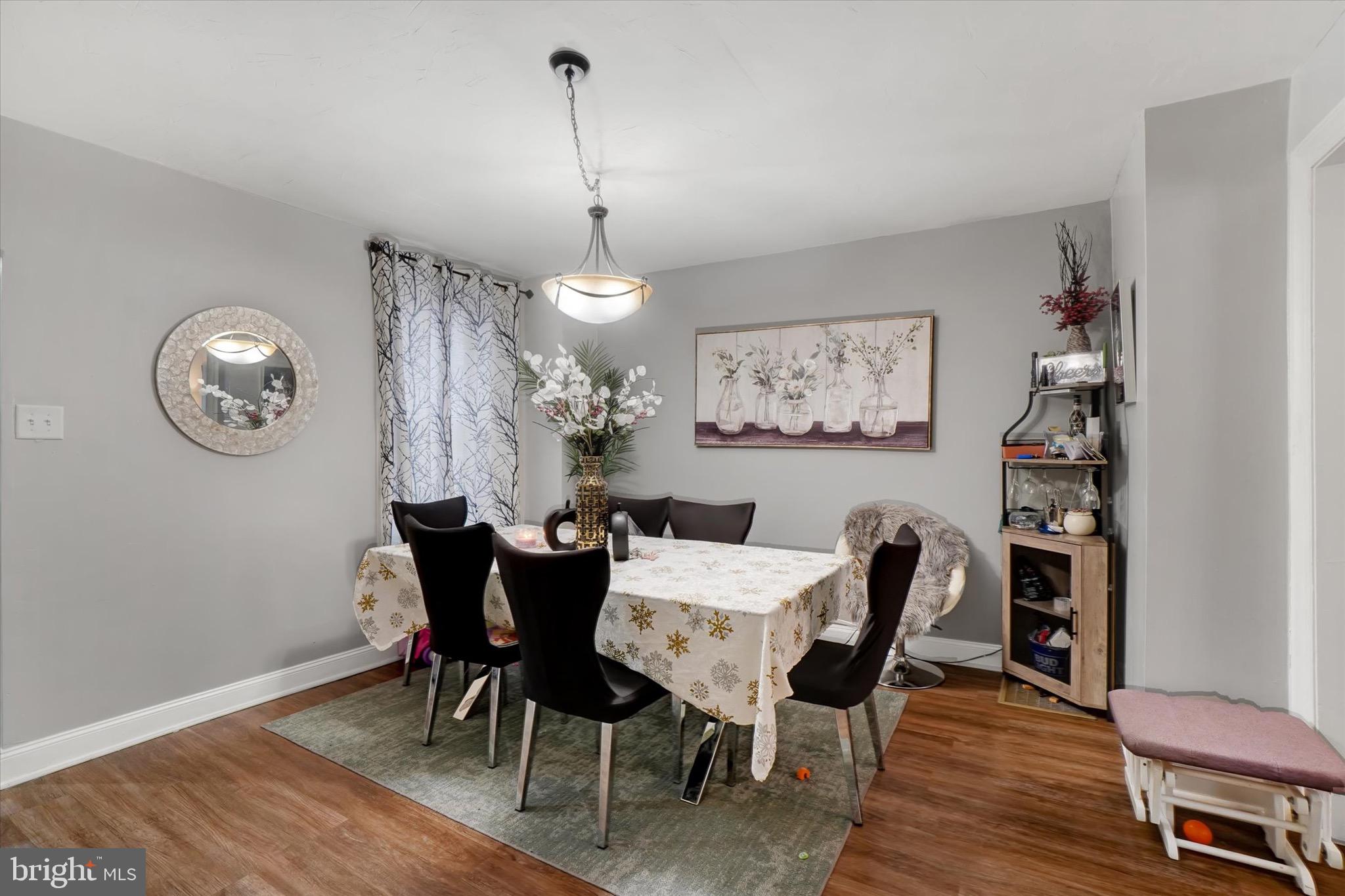442 South Duke Street York, PA 17401 - Photo 7 of 24 a view of a dining room with furniture and wooden floor