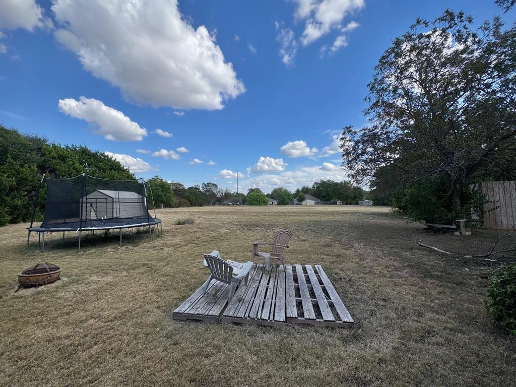 325 Ivy Lane Hewitt, TX 76643 - Photo 2 of 4 a view of a backyard with sitting area