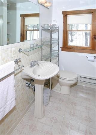 38 Ridge Road Tolland, MA 01034 - Photo 17 of 21 a bathroom with a sink toilet and a bathtub