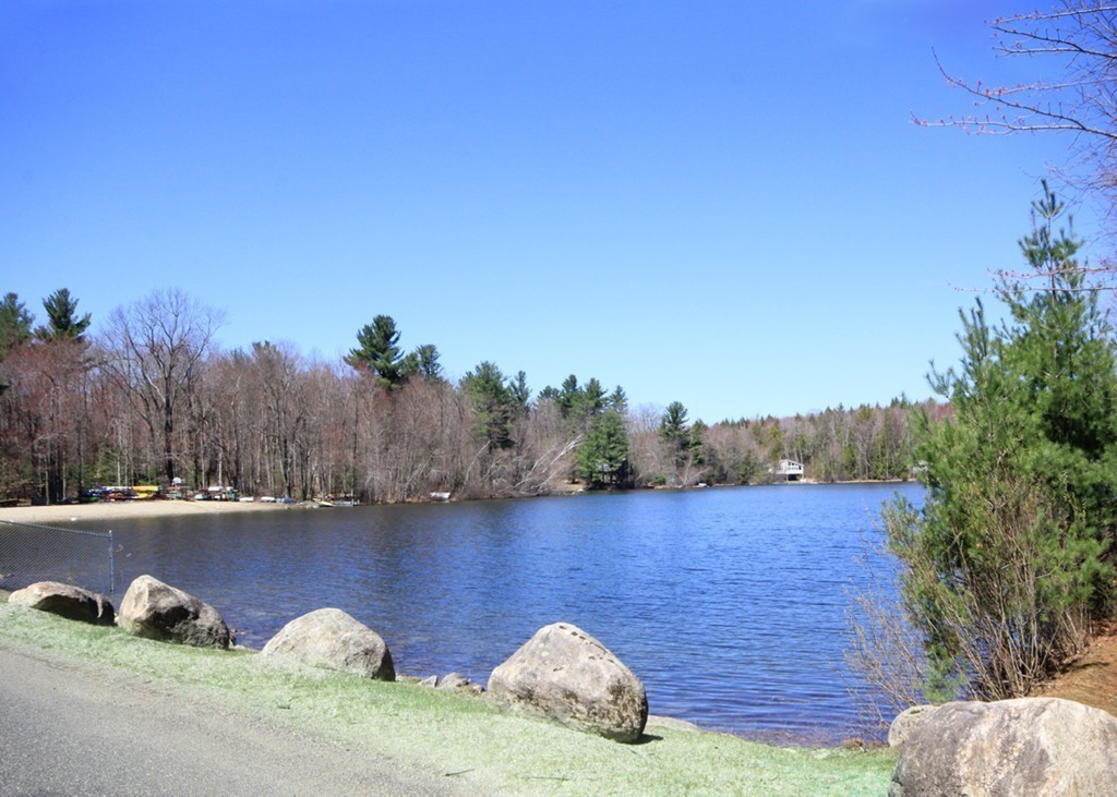 38 Ridge Road Tolland, MA 01034 - Photo 2 of 21 a view of a lake from a balcony