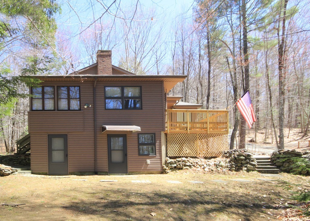 38 Ridge Road Tolland, MA 01034 - Photo 4 of 21 a front view of a house with a yard