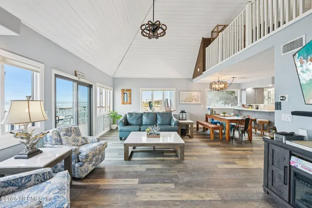 a living room with furniture and a table