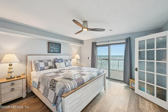 a bathroom with a toilet and bathtub