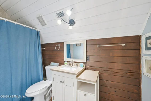 a room with gym equipment and a window