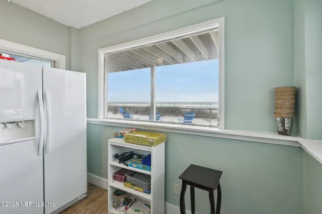 a view of a swimming pool and an outdoor seating