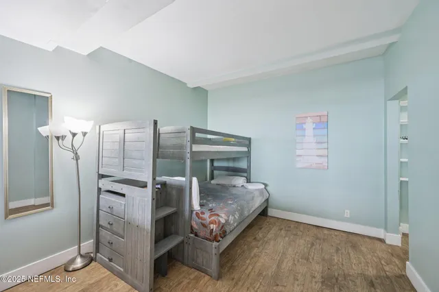 a view of living room with furniture and floor to ceiling window