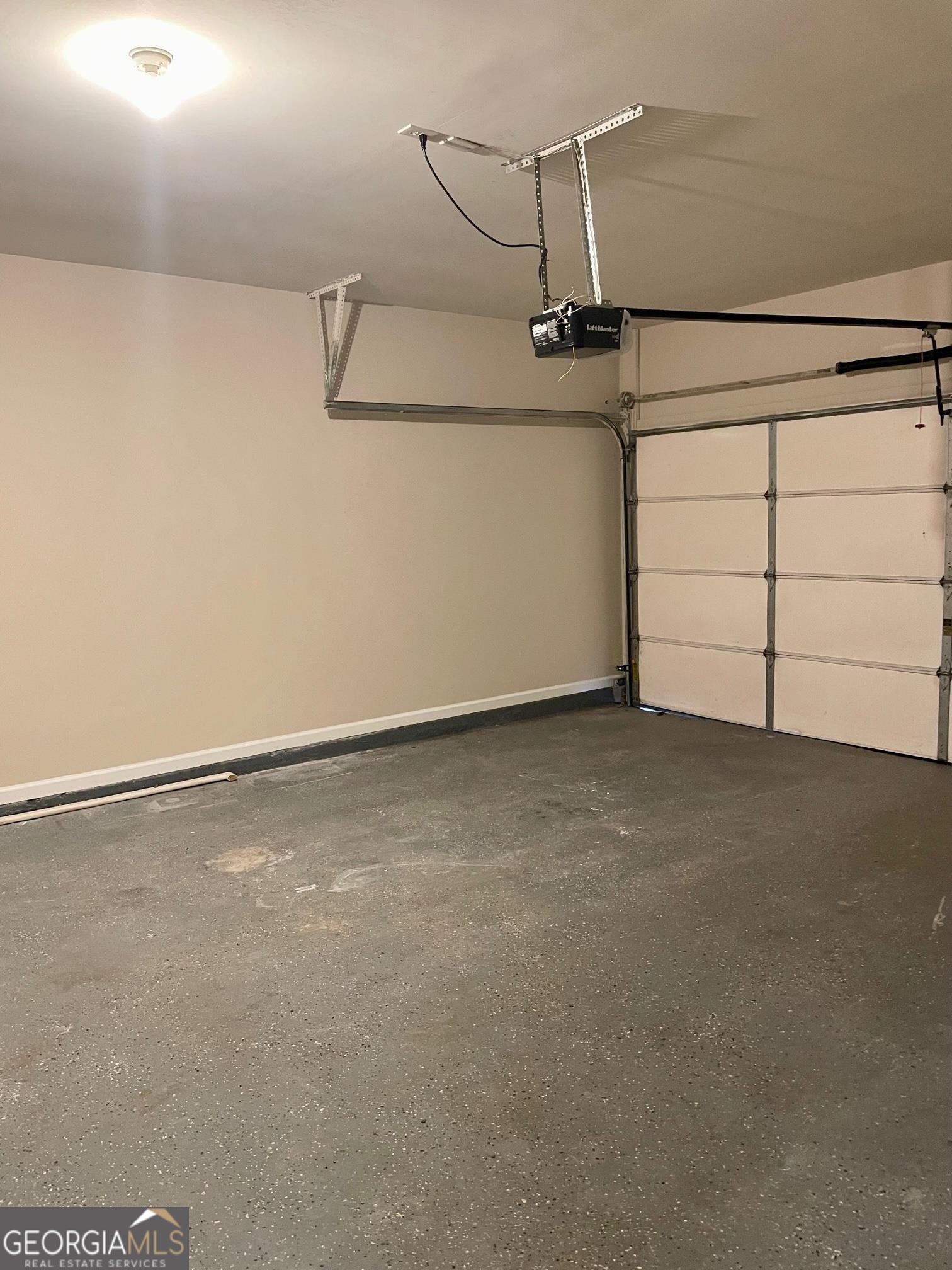 5371 Apple Grove Road Northeast Buford, GA 30519 - Photo 15 of 17 a view of a room with racks on the wall