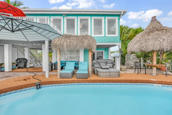 a view of a street with an ocean view