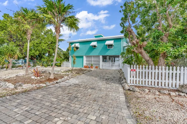 a front view of a house with a porch
