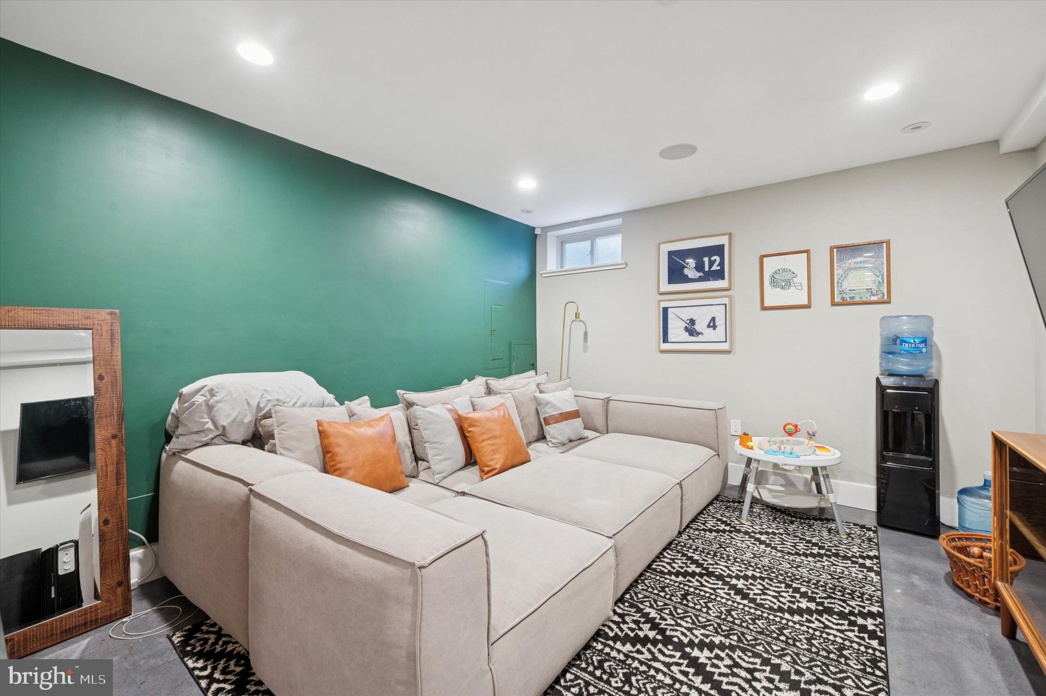 1942 Tasker Street Philadelphia, PA 19145 - Photo 24 of 35 a bedroom with a bed and a television
