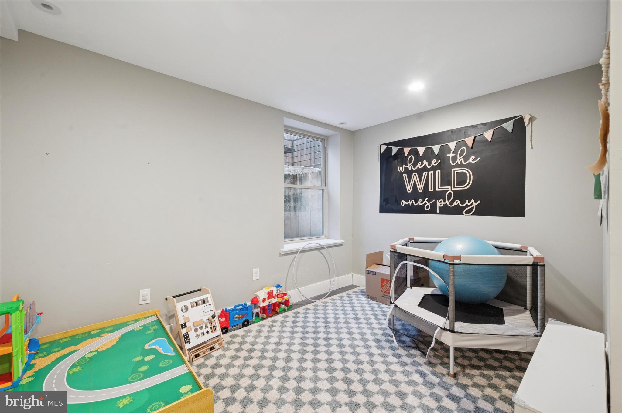 1942 Tasker Street Philadelphia, PA 19145 - Photo 25 of 35 a living room with a couch and a table in it