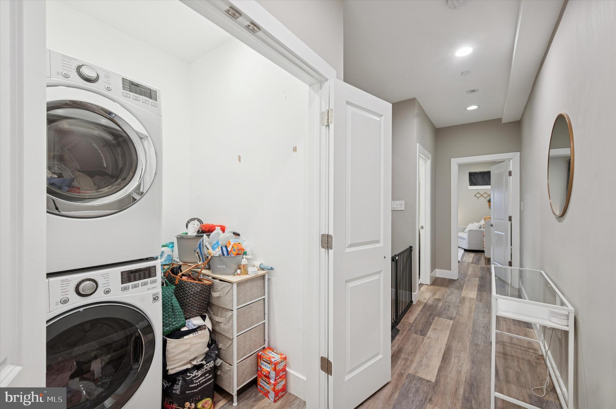1942 Tasker Street Philadelphia, PA 19145 - Photo 26 of 35 a view of a hallway with washer and dryer