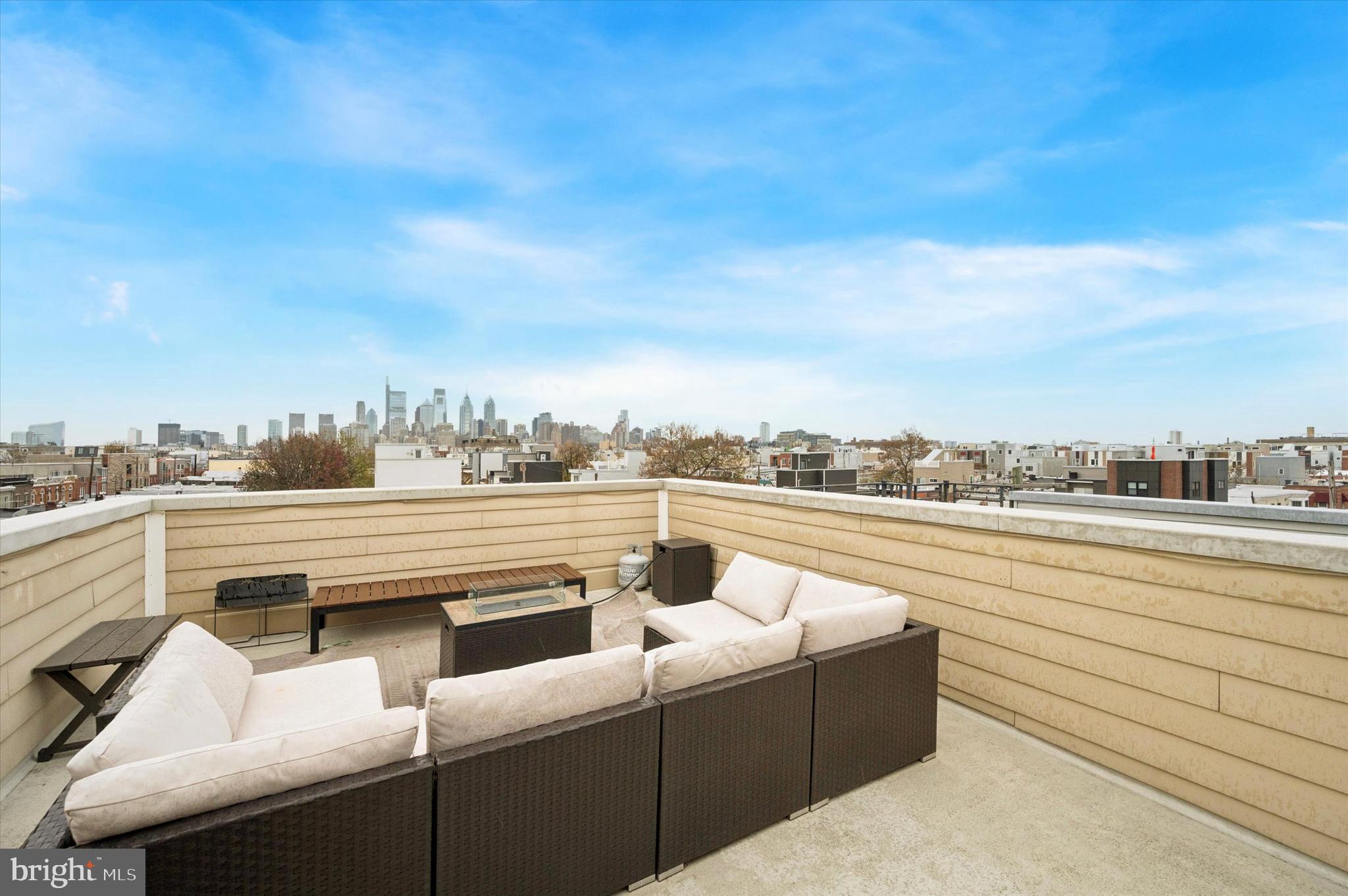1942 Tasker Street Philadelphia, PA 19145 - Photo 29 of 35 a view of a terrace with lawn chairs