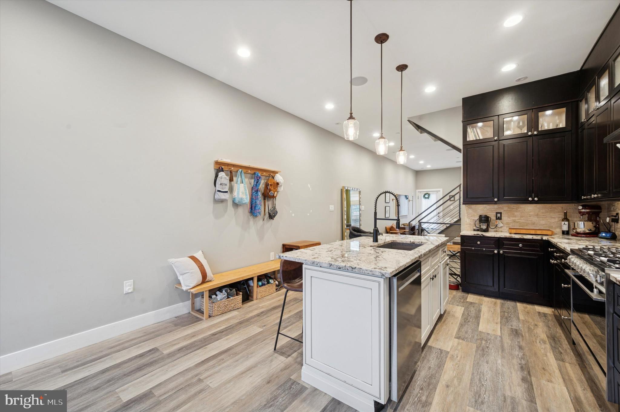 1942 Tasker Street Philadelphia, PA 19145 - Photo 3 of 35 a kitchen with a stove and a sink