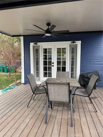 a kitchen with stainless steel appliances a refrigerator a stove a microwave a sink and cabinets