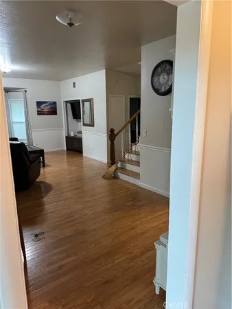 a bed room with a bed and a chair