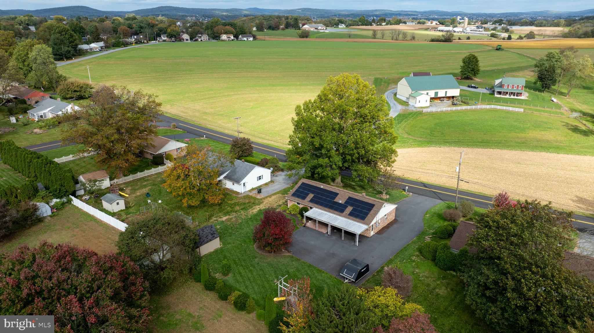 810 Snyder Hill Road Lititz, PA 17543 - Photo 3 of 62 an aerial view of a house with a lake view