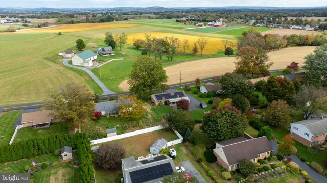 a view of a house with a street