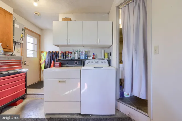 an aerial view of a city with a lake view