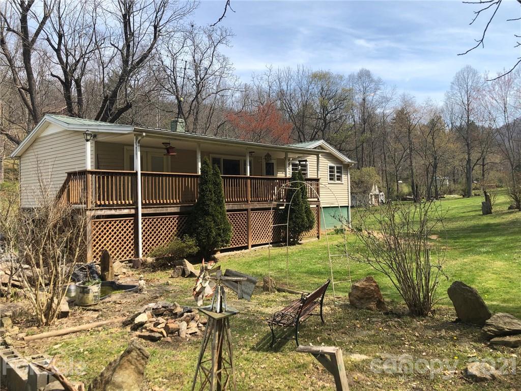 289 Long Branch Road Clyde, NC 28721 - Photo 3 of 44 a view of a house with backyard