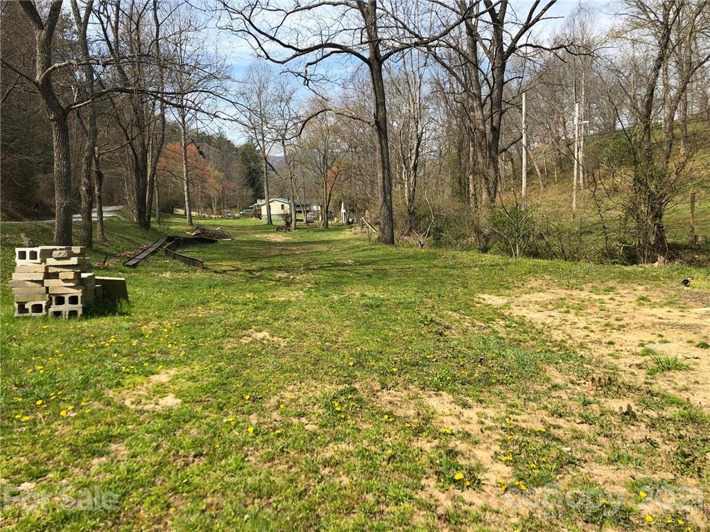 289 Long Branch Road Clyde, NC 28721 - Photo 37 of 44 a view of a fountain in front of a house