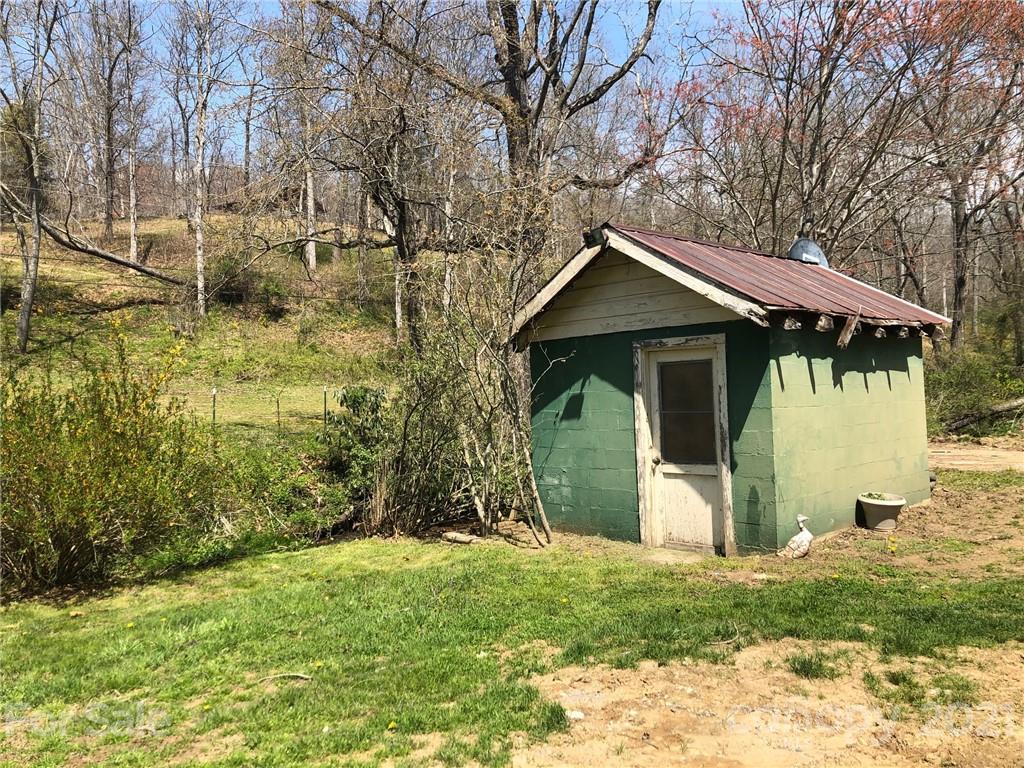 289 Long Branch Road Clyde, NC 28721 - Photo 42 of 44 a view of a house with backyard
