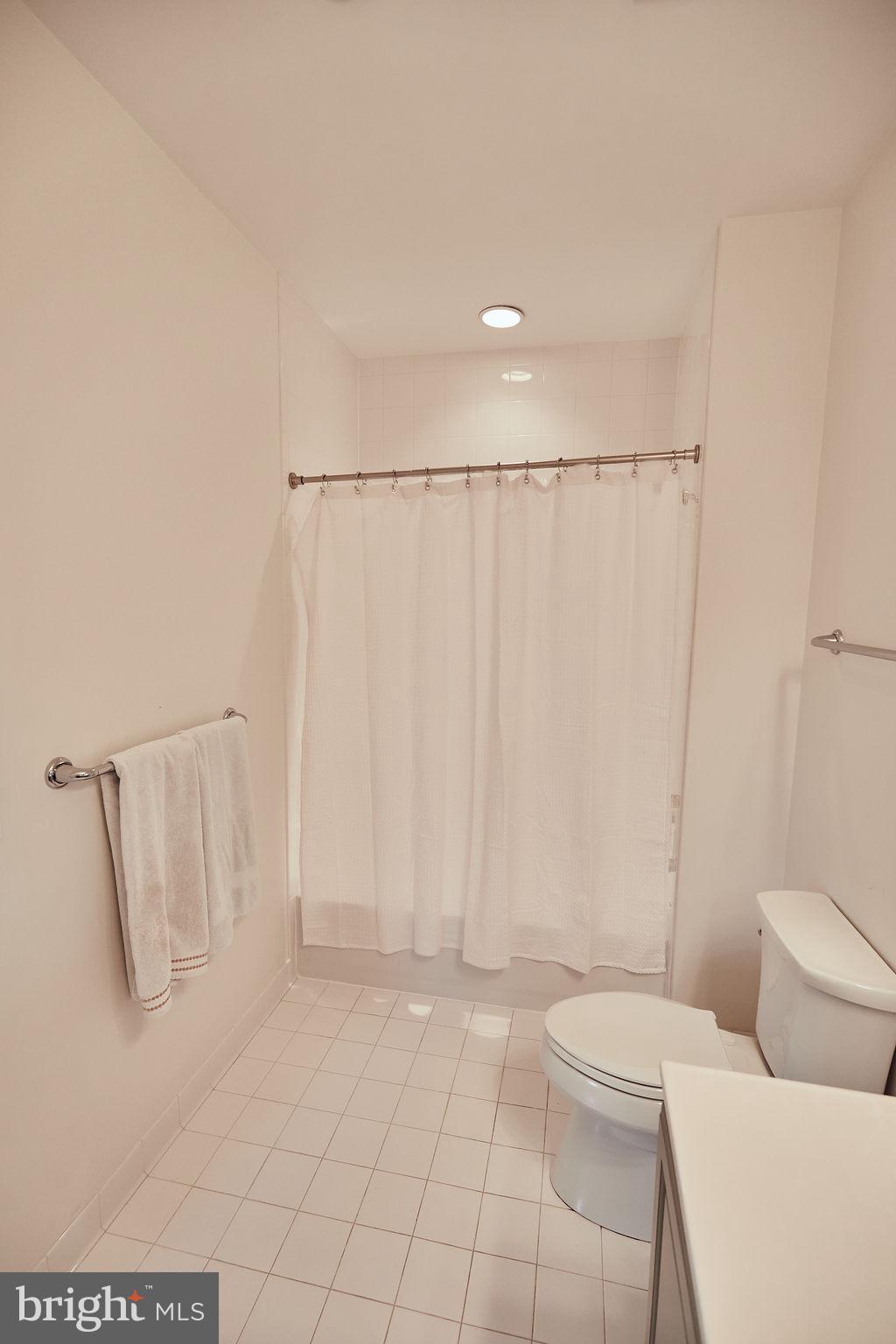 6306 Canter Way, Unit 13 Baltimore, MD 21212 - Photo 33 of 63 a bathroom with a toilet and shower