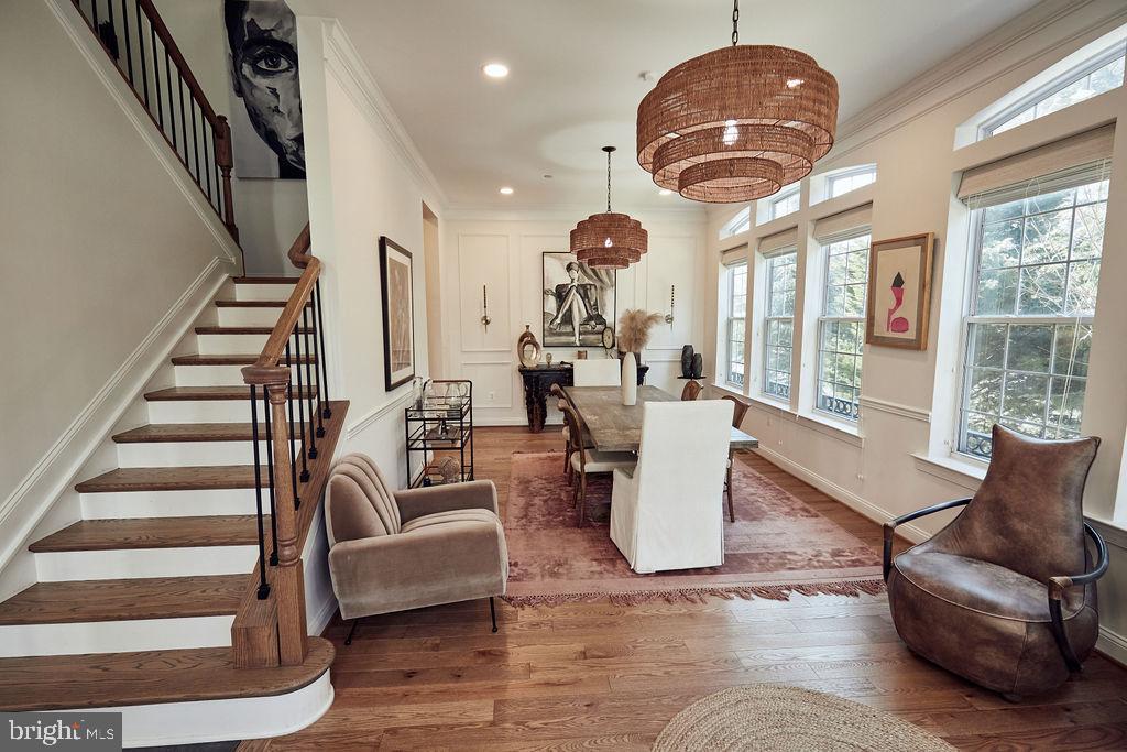 6306 Canter Way, Unit 13 Baltimore, MD 21212 - Photo 4 of 63 a living room with furniture fireplace and large windows