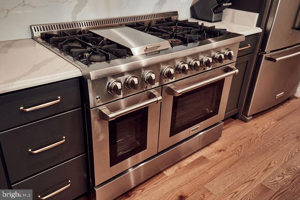 6306 Canter Way, Unit 13 Baltimore, MD 21212 - Photo 10 of 63 a close up of a stove top oven sitting inside of a kitchen