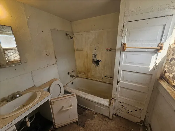 a bathroom with a sink and a tub