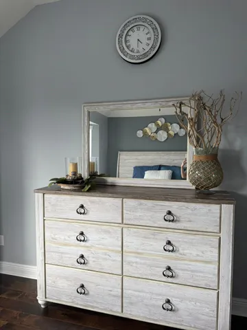 a room with furniture and screen