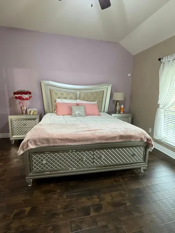 a room with furniture and a wooden floor