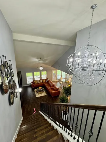 a view of a living room with furniture