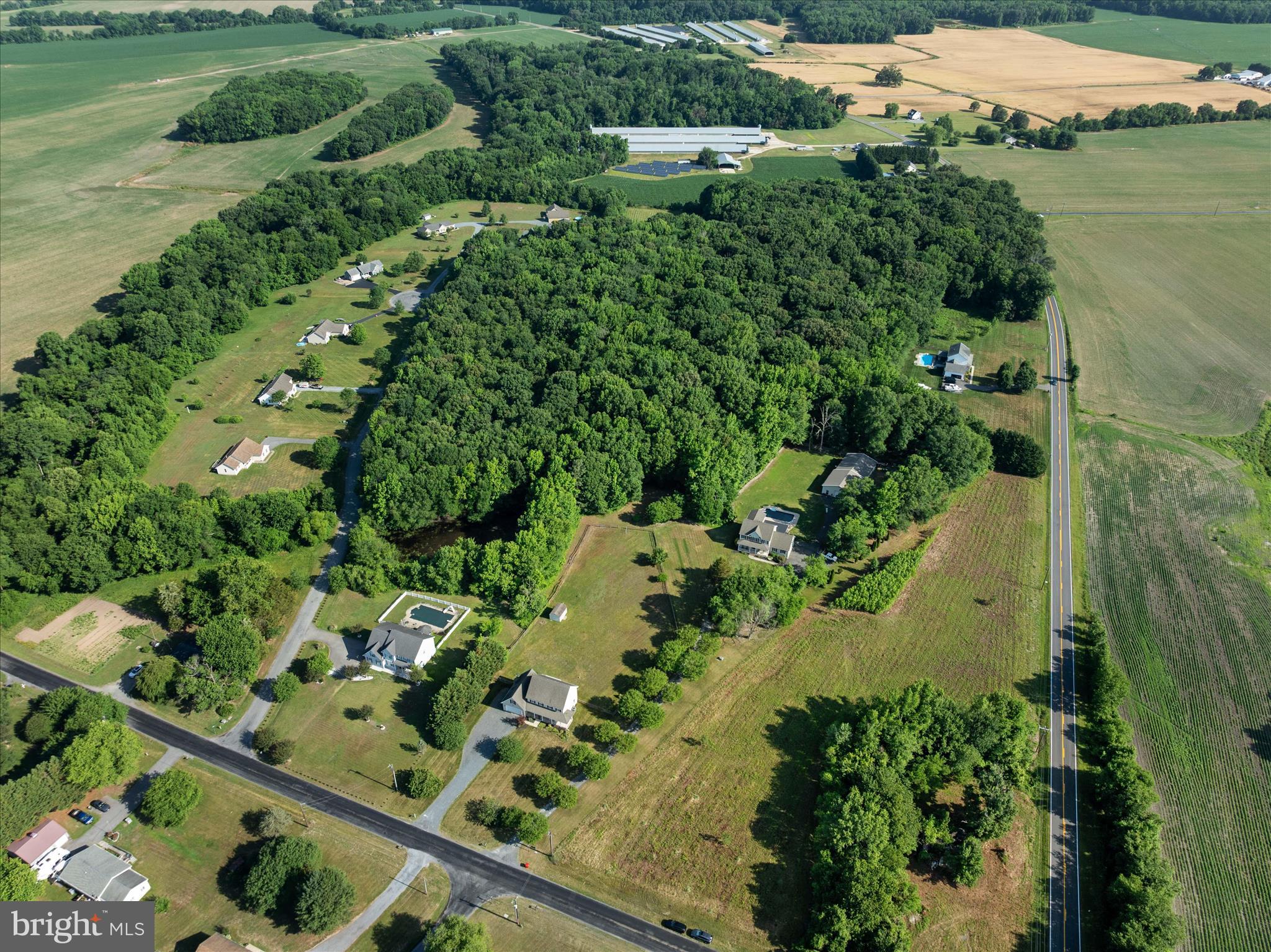 913 Clark Corner Road Centreville, MD 21617 - Photo 59 of 66 an aerial view of a residential houses with outdoor space and trees all around