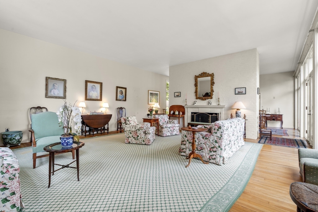 3 Proctor Street Manchester, MA 01944 - Photo 14 of 41 a living room with furniture and a fireplace
