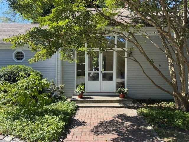 3 Proctor Street Manchester, MA 01944 - Photo 2 of 41 a front view of a house with garden