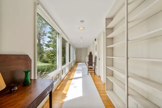 a view of a living room with a large window