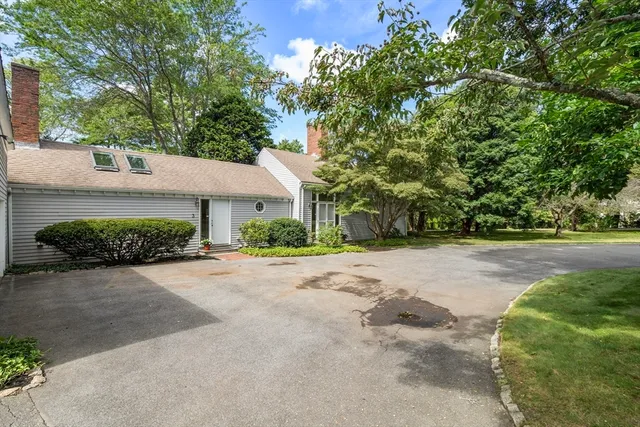 a view of a house with a street