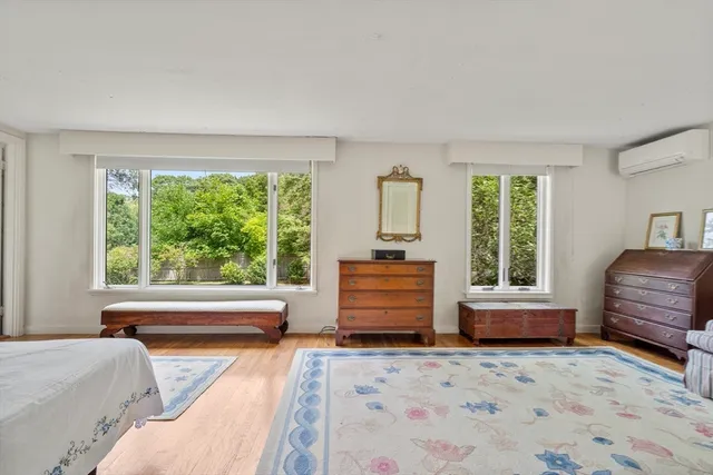 a living room with furniture and windows