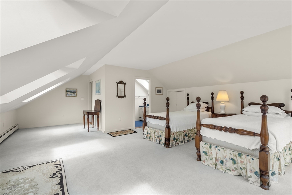 3 Proctor Street Manchester, MA 01944 - Photo 36 of 41 a bedroom with bed and window