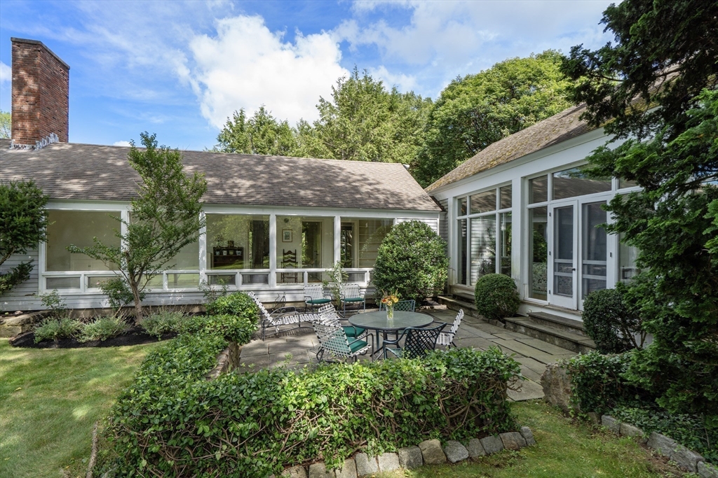 3 Proctor Street Manchester, MA 01944 - Photo 37 of 41 a view of house with a yard and garden