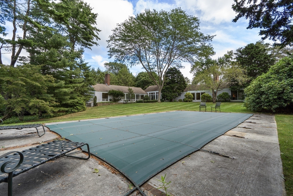 3 Proctor Street Manchester, MA 01944 - Photo 39 of 41 a view of a tennis ground with large trees