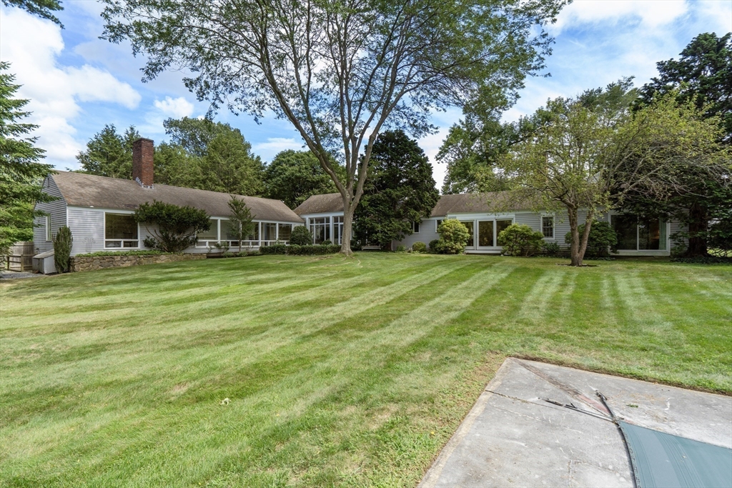 3 Proctor Street Manchester, MA 01944 - Photo 6 of 41 a view of a house with a yard