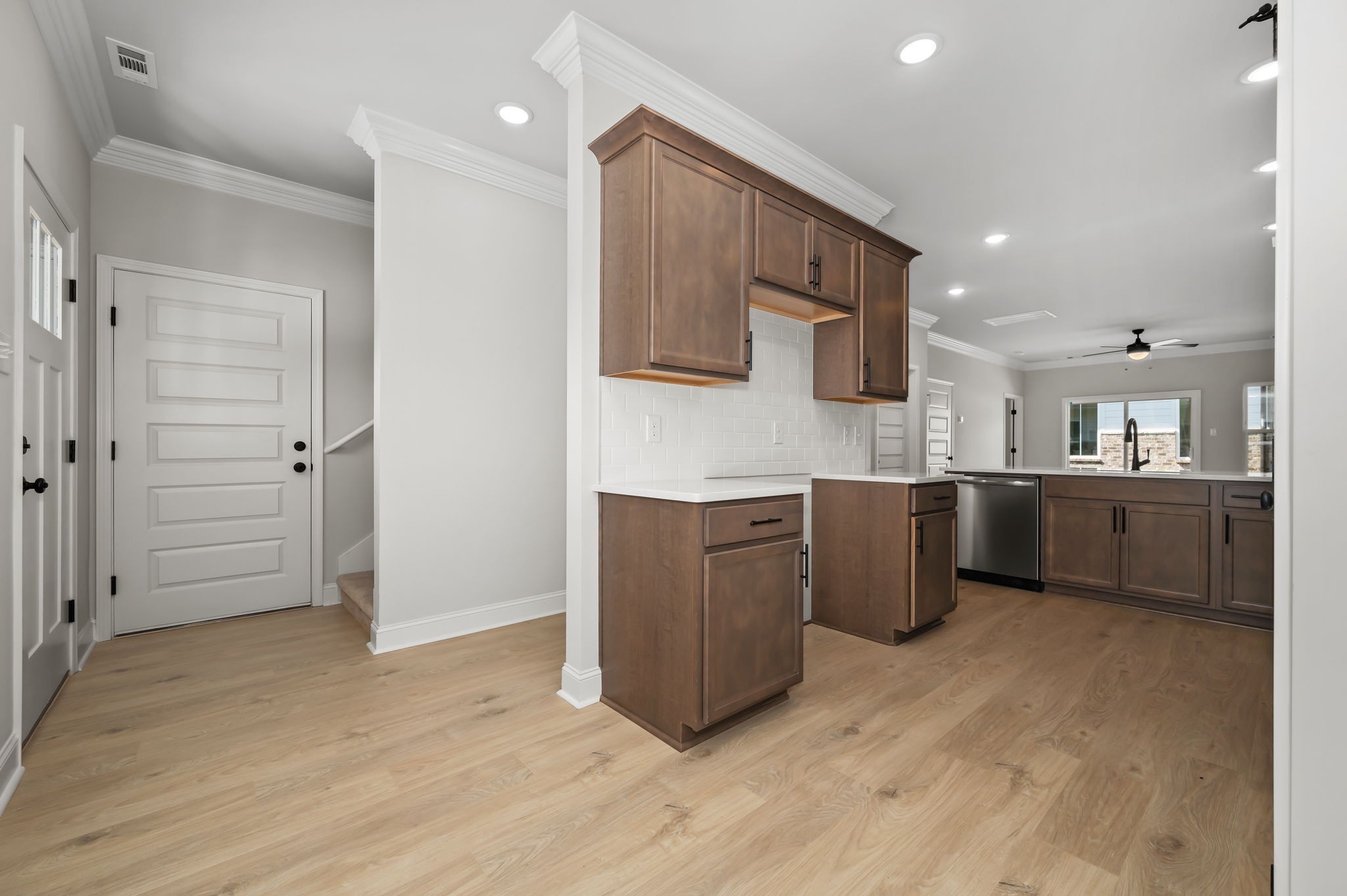 522 Rohan Drive Murfreesboro, TN 37129 - Photo 2 of 33 a kitchen with stainless steel appliances kitchen island wooden cabinets and granite counter tops