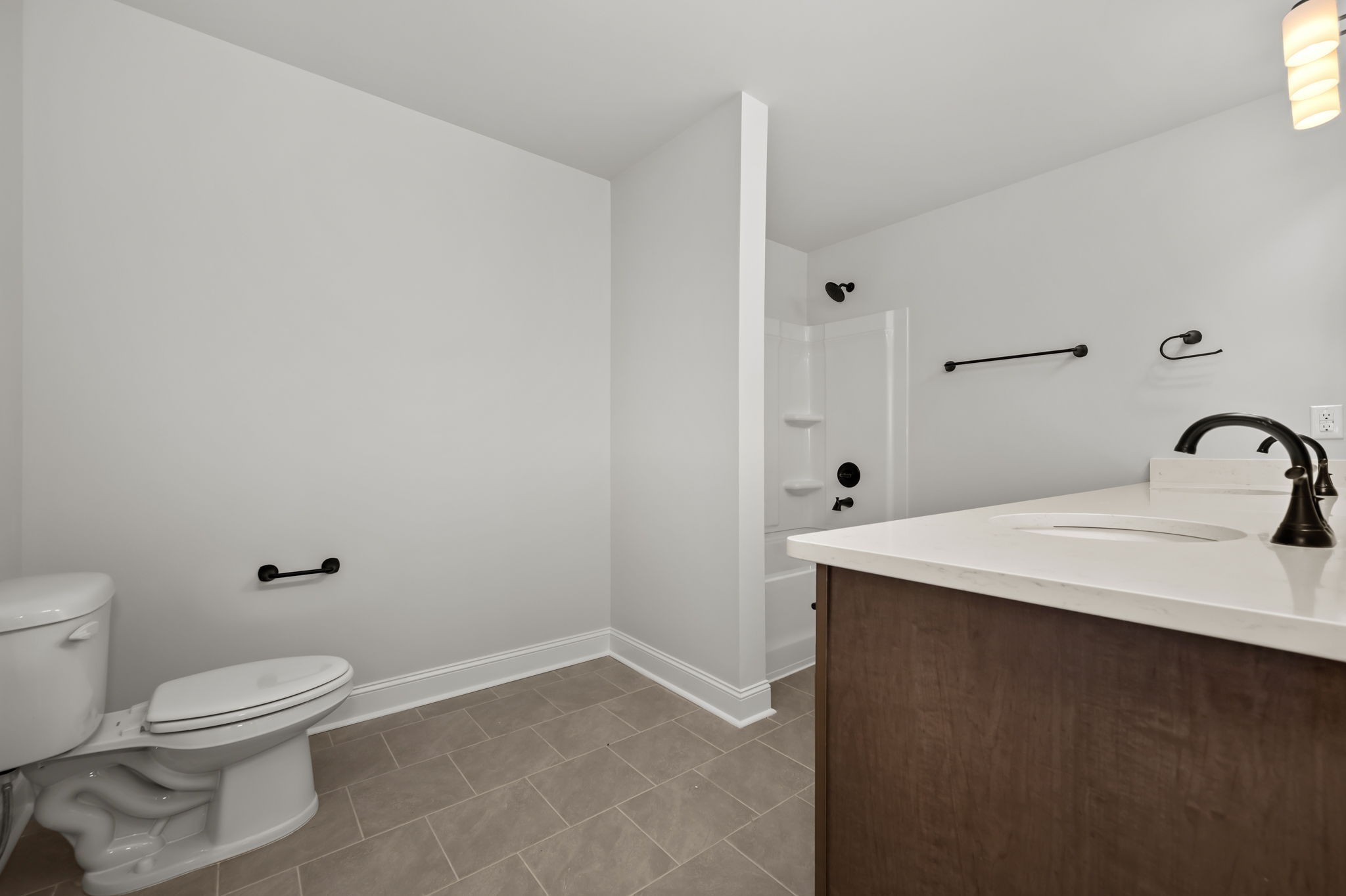 522 Rohan Drive Murfreesboro, TN 37129 - Photo 21 of 33 a bathroom with a sink a toilet and shower