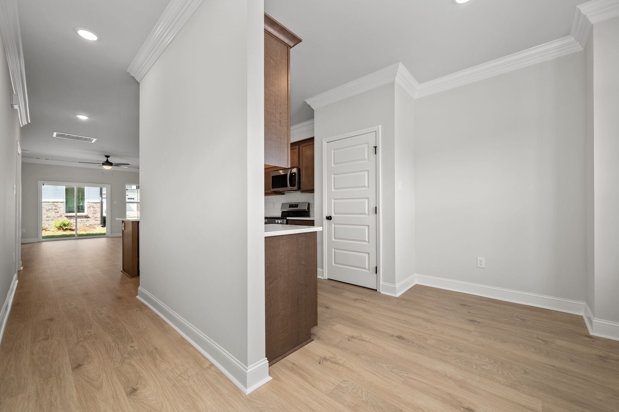 522 Rohan Drive Murfreesboro, TN 37129 - Photo 3 of 33 a view of kitchen space with wooden floor