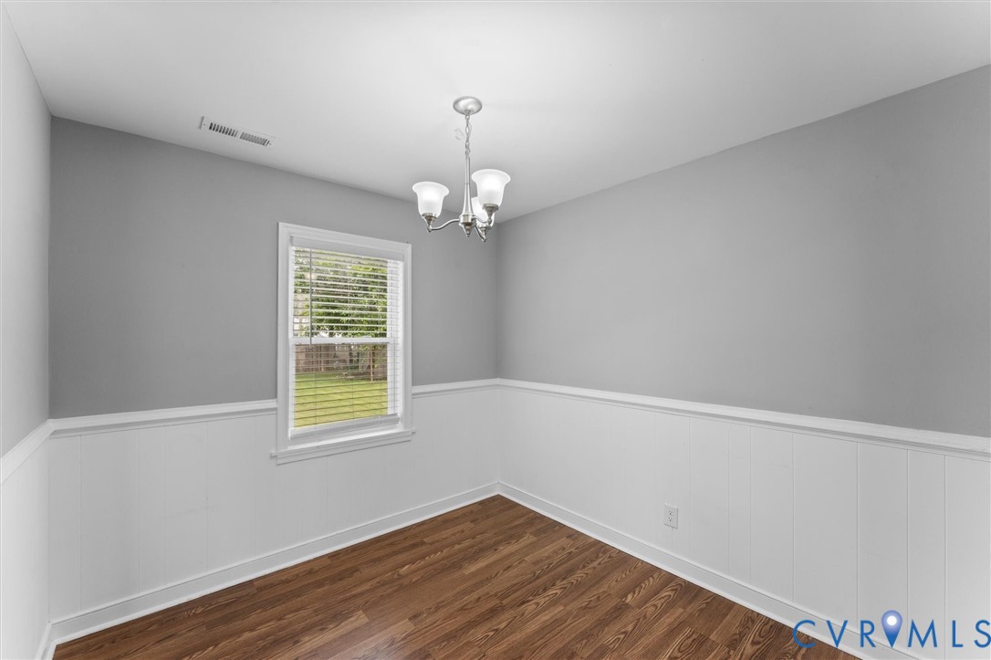 3424 Danbury Road Richmond, VA 23234 - Photo 17 of 37 Unfurnished room featuring wainscoting, dark wood-