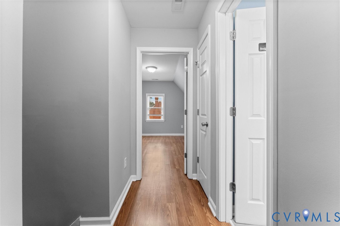 3424 Danbury Road Richmond, VA 23234 - Photo 21 of 37 Hall with light wood-type flooring and baseboards