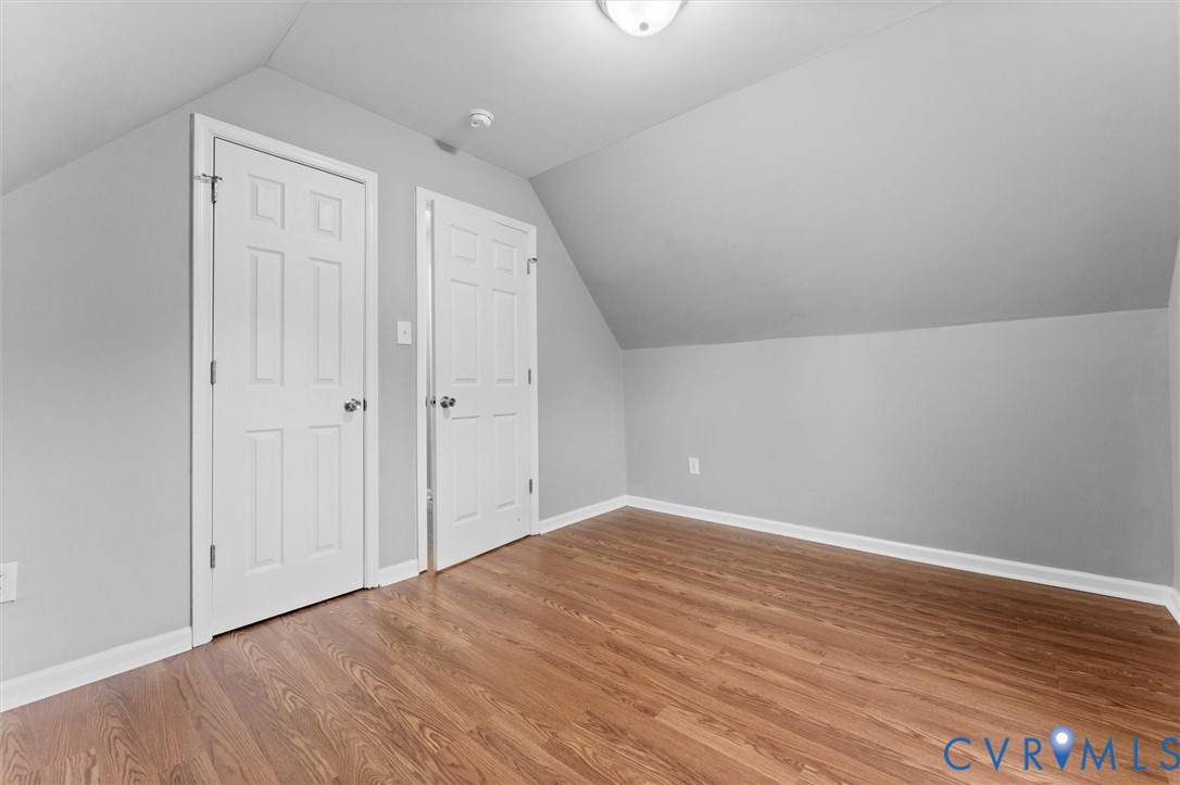 3424 Danbury Road Richmond, VA 23234 - Photo 30 of 37 Additional living space with lofted ceiling and li