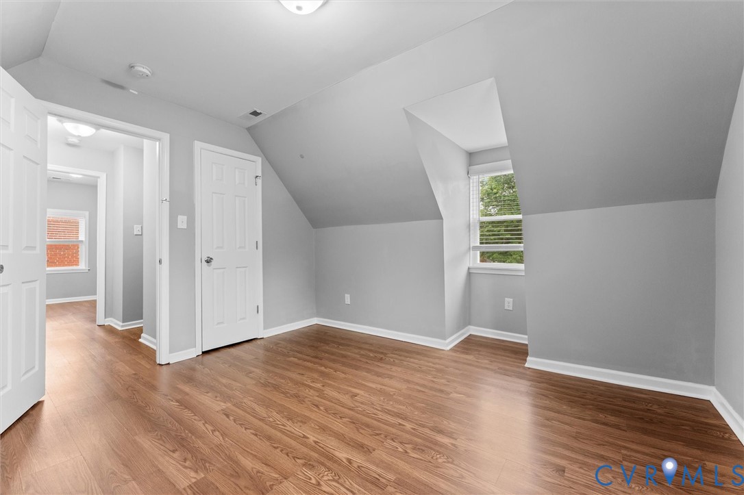 3424 Danbury Road Richmond, VA 23234 - Photo 31 of 37 Bonus room featuring vaulted ceiling and light woo